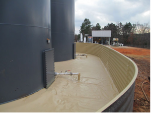Above ground storage tank containment, containment wall, storm water accumulation, oil leak detection